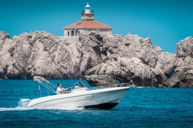 BLUE CAVE & ELAPHITI ISLANDS 4 HOURS ALL INCLUSIVE boat tour - Šunj Beach Stop: One Hour of Real Sand Time