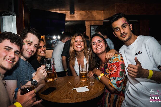 Columbo Pub Crawl Dubrovnik - The second bar: welcome shot, glow paint, and Perfect Match