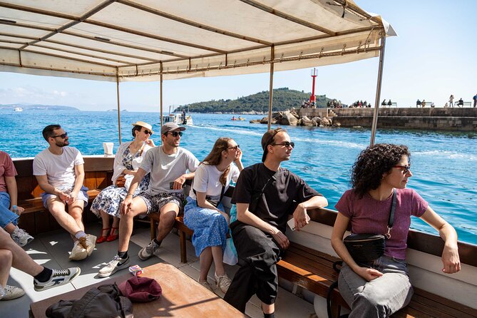 Dubrovnik 45-Minute Boat Tour Around Old Town Walls - Lokrum Island pass-by: a green break off Dubrovnik