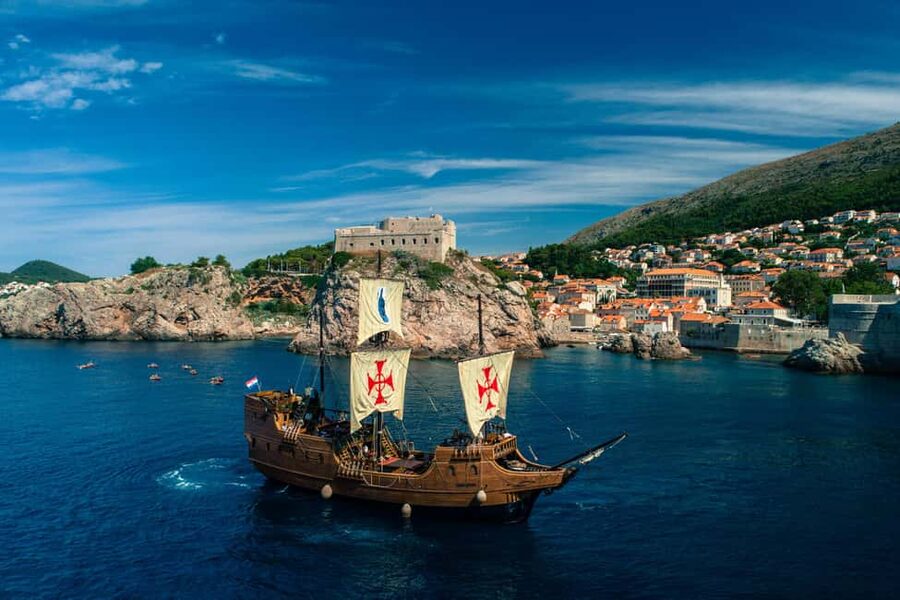 Dubrovnik: Galleon Sunset Cruise with a Live Guide & Drink - Boarding the Galleon Tirena: welcome drink and first views