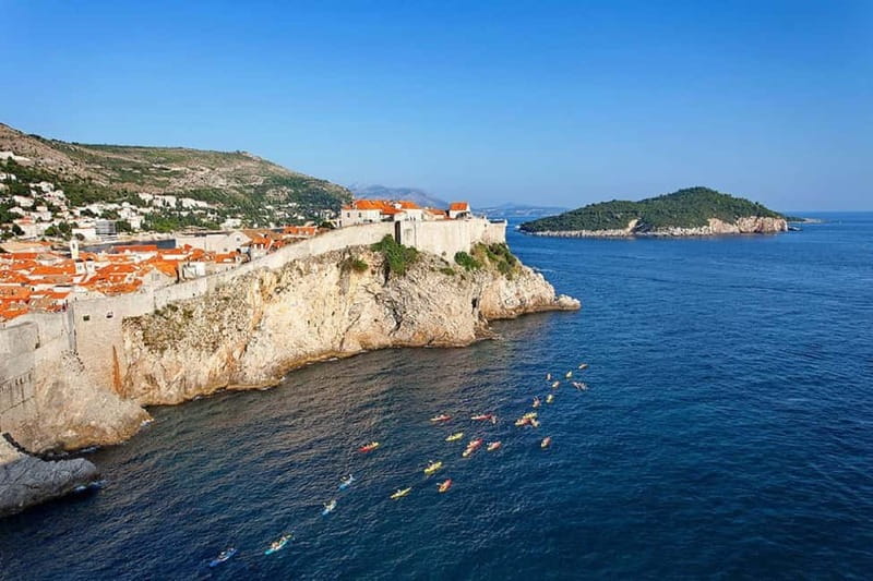 Dubrovnik: Guided Sunset Sea Kayaking Tour with Wine - Paddling from Pile Gate to Dubrovnik’s Walls: The City Looks Different Here