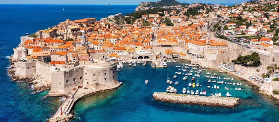 Dubrovnik: Old City Walking Tour with a FREE Polaroid Photo - Starting at Tvrdava Revelin, Arms Square, the cannon, and an orange umbrella