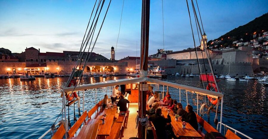 Dubrovnik: Old Town Cruise with Lunch - Finding the white boat Slavija in the Old Port
