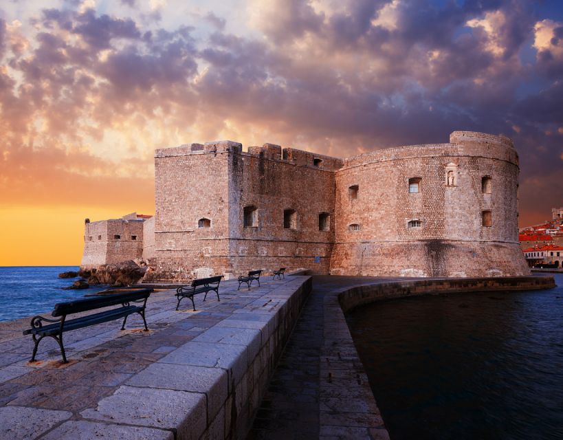 Dubrovnik: Old Town Highlights Guided Evening Walking Tour - Stradun after dark, the street where locals actually stroll