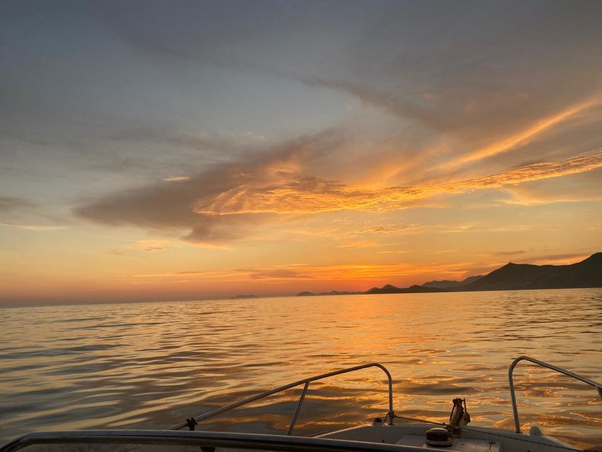 Dubrovnik: Romantic Sunset Cruise - Boarding at the Old Town Pier and What the Boat Experience Feels Like