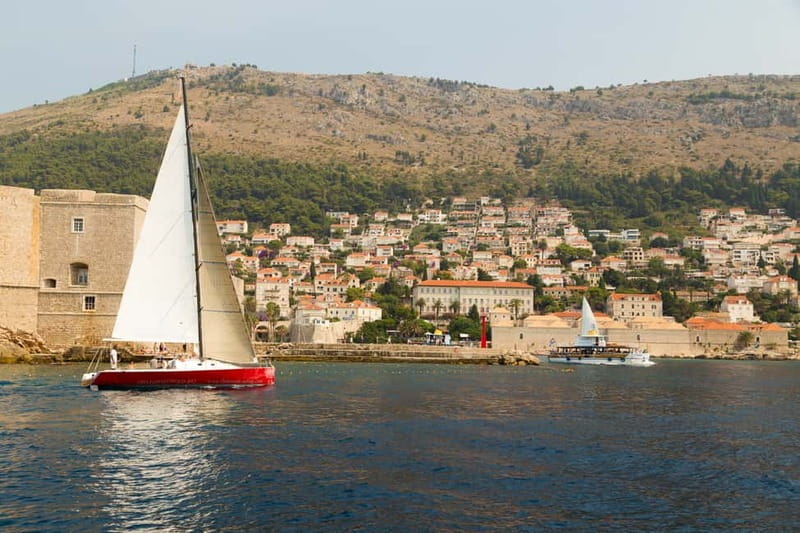 Dubrovnik: Romantic Sunset Sailing Adventure - Seawater moments: photos, possible dips, and watching for dolphins