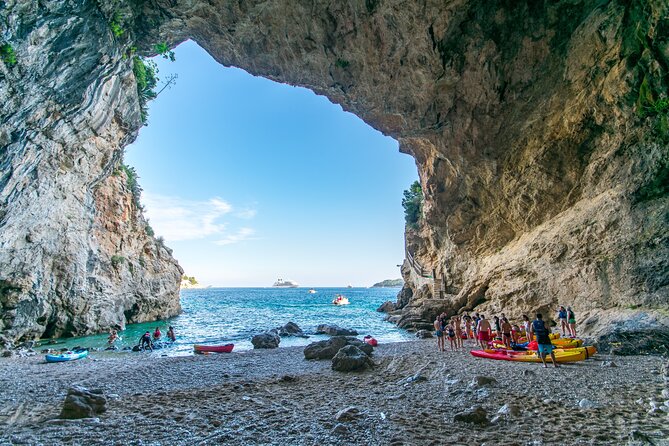 Dubrovnik Sea Kayaking Sunset Paddle - Betina Cave beach: snorkel reefs, a swim-in cave, and optional cliff jumping