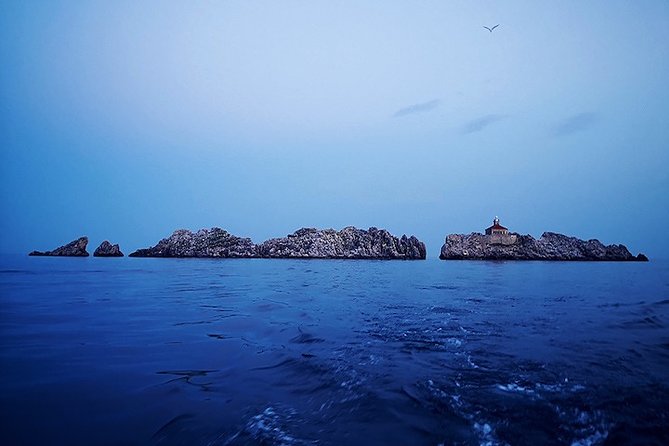 Dubrovnik Sunset Cruise - Private Boat Tour - Old Town waterfront and city wall views from the sea