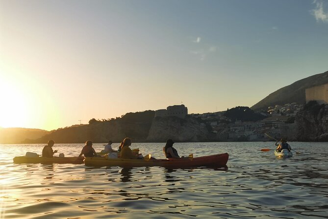 Dubrovnik: Sunset Kayak & Snorkel Tour with Wine & Water - Betina Cave Beach: Snack and Snorkeling Time