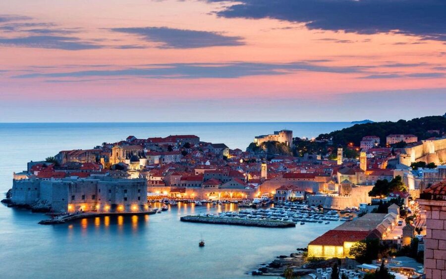 From Dubrovnik: Golden Hour Sunset Cruise with Free Drinks - The boat experience: small group comfort and a relaxed vibe