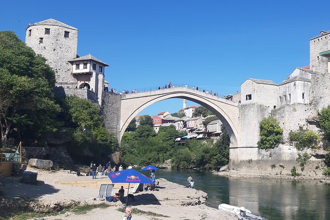 Private Day Tour to Mostar, Pocitelj and Kravica Waterfalls - Stop 3: Mostar Old Bridge area, lunch time, and bazaar browsing