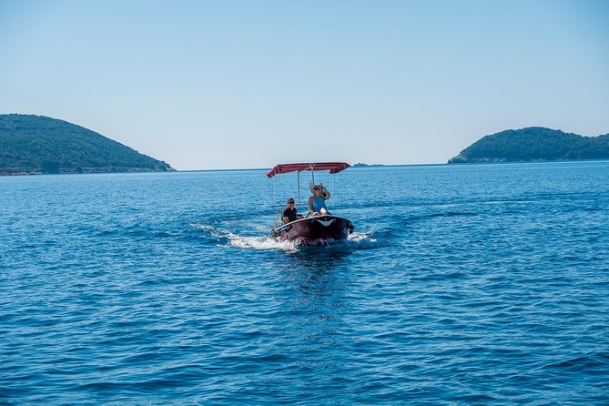 Rent a small boat without skipper - explore the islands and find hidden caves - Inside the Boat: Shade, Snorkel Gear, and Storage That Helps
