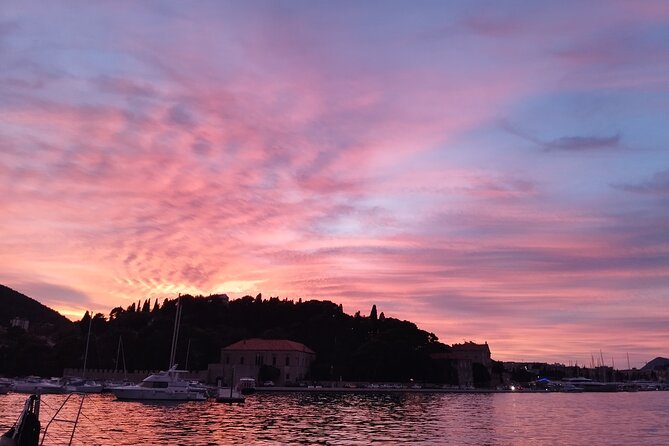 Sunset Catamaran Tour from Old Town Dubrovnik - Gliding along the city walls: the main event