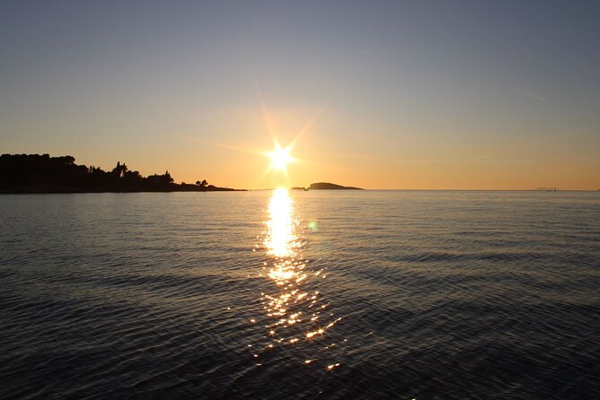 Sunset Cruise Trip with Unlimited Drinks from Cavtat - Bobara Island From the Water: Wild Green, Rugged Edges