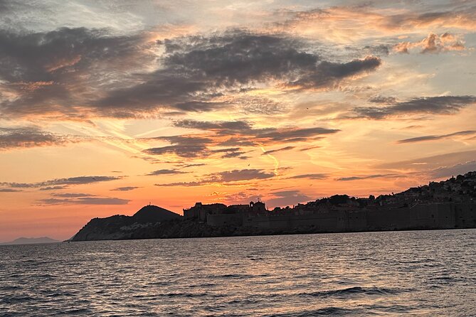 Sunset Panorama Boat Tour around Old Town Dubrovnik - Banje Beach at the End, Where the Light Wraps Up