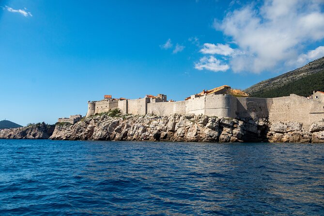 Sunset Panorama Cruise in Dubrovnik - Lokrum Island Pass-By: Pines, Rocks, and Monastery Clues